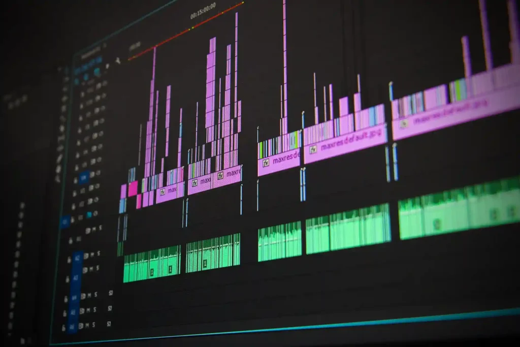 Close-up of a video editing timeline with audio and video tracks in a digital interface, illustrating the use of an AI video generator for content creation