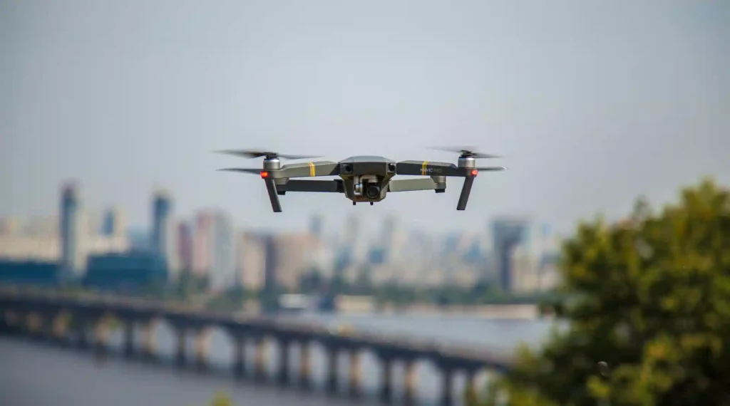 AI-powered drone flying over a construction site, highlighting the use of advanced architecture tools for site monitoring and data analysis.