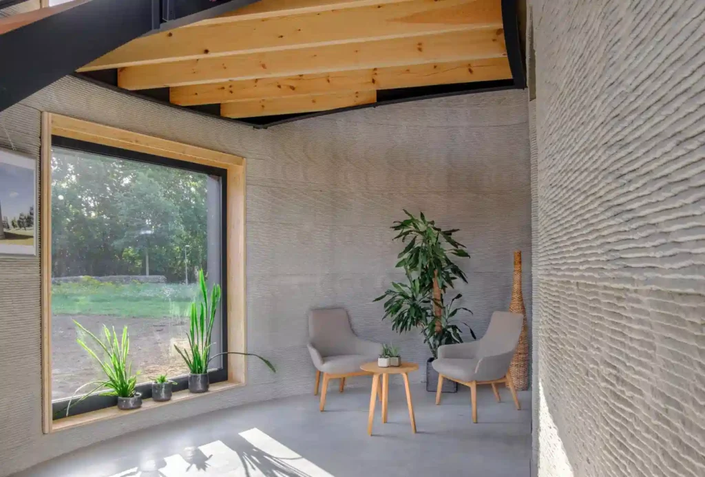 Modern living room inside a modular home built with AI, showcasing natural materials and innovative design.